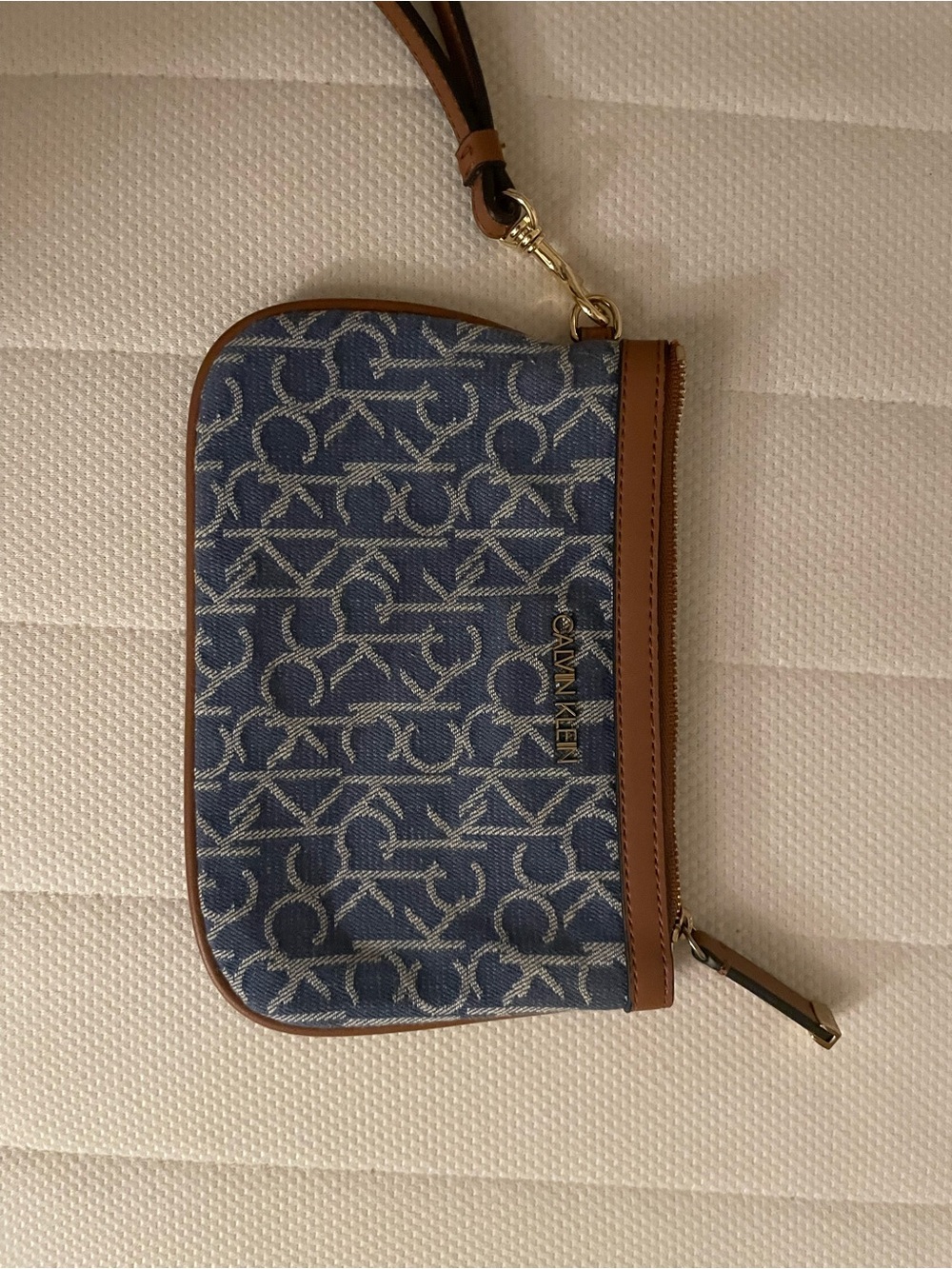Calvin Klein Brown Monogram Wristlet with Gold Hardware